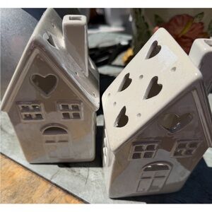 Ceramic houses holds votives like new 2 of them for listing price.